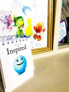 "inspired" calendar in front of colorful frame