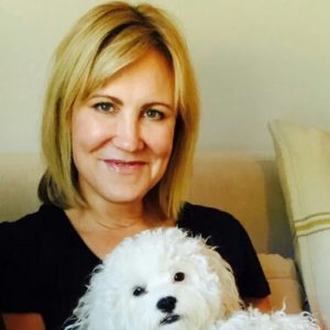 Jennifer Holmes profile with a fluffy dog